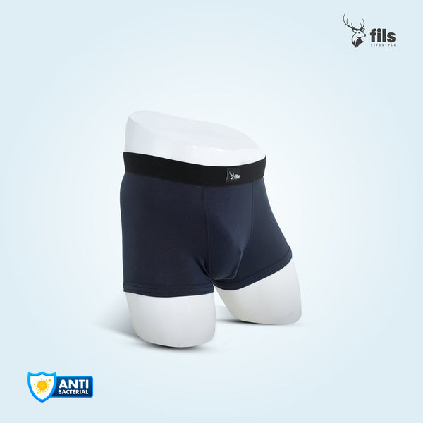 Black boxer briefs with white waistband on a light gray background, featuring the 'fils' brand logo.