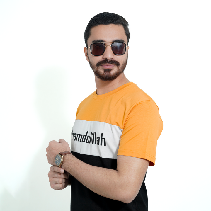 Male model wearing Fils Lifestyle Men's Premium T-Shirt - Alhamdulillah showing sleeve.