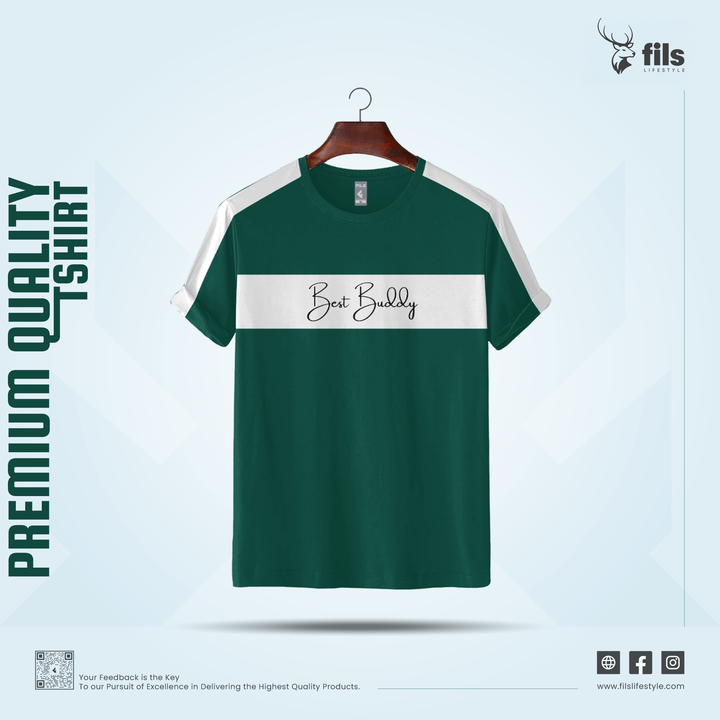 Green t-shirt with 'Best Buddy' text on a hanger against a light blue background