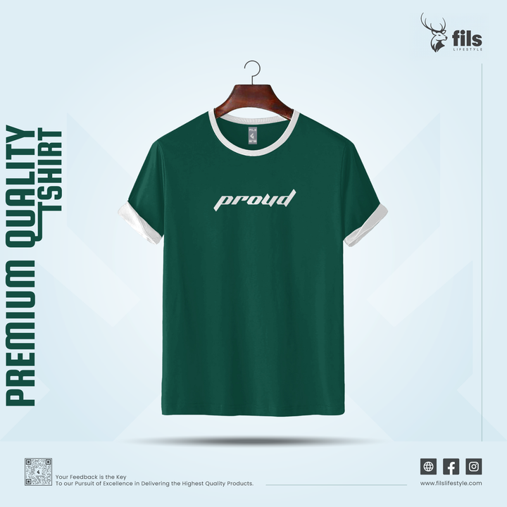 Green t-shirt with 'proud' text on a hanger against a light blue background, featuring the brand 'fils'.