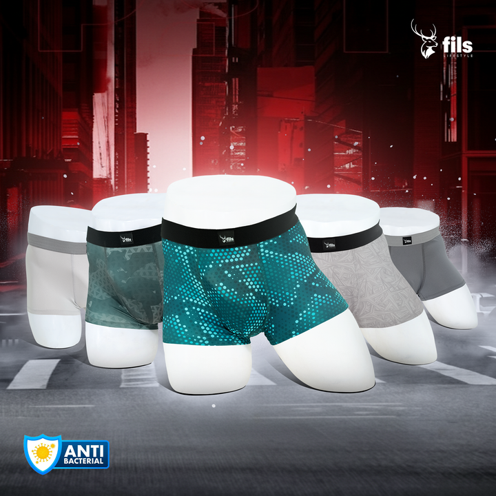 Men's underwear displayed on mannequins with 'Feel Fresh, Feel Comfort' text and brand logo.