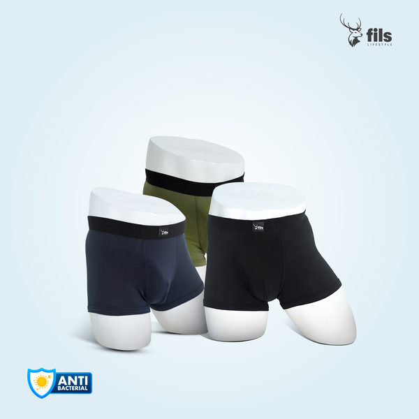 Three pairs of men's underwear on mannequins with 'fils' branding and antibacterial logo.